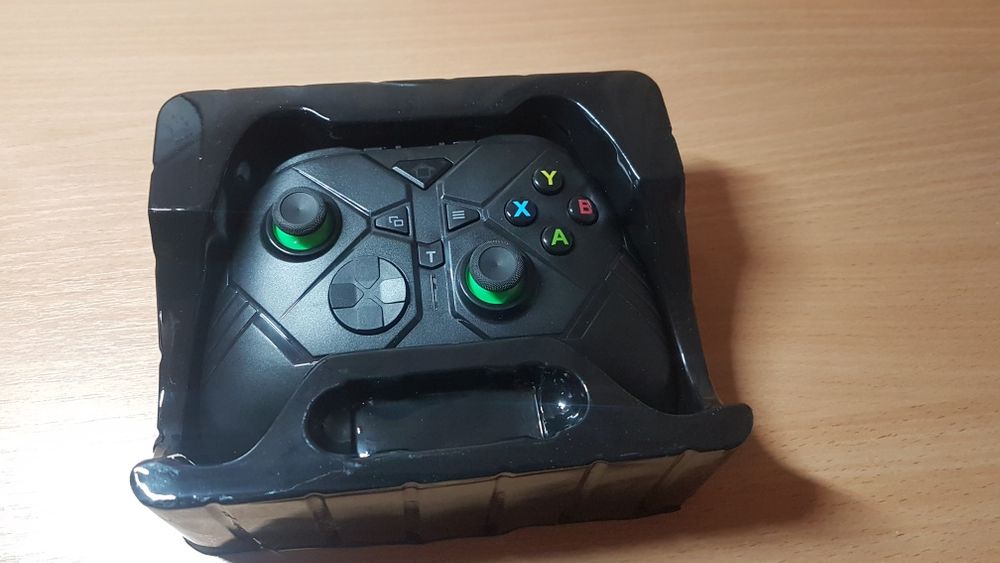 Продам новый беспроводной геймпад с адаптером