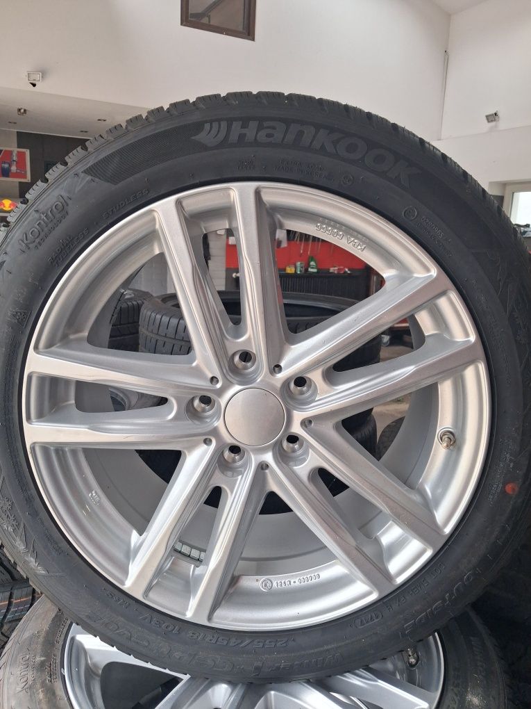 Nowe felgi z nowymi oponami zimowymi  5x112 . 255/45 r18