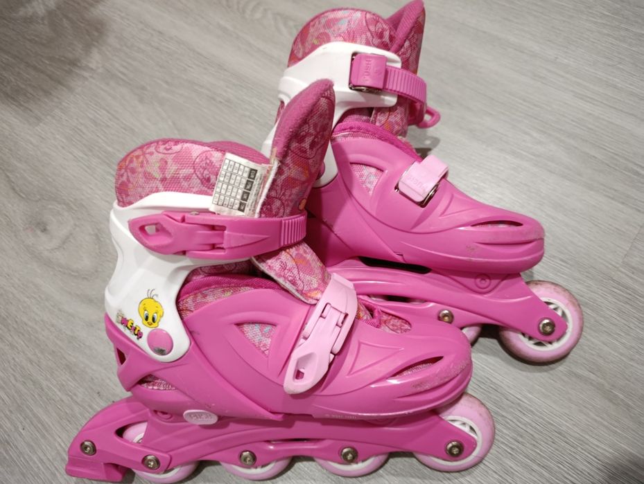 Patins em linha rosa