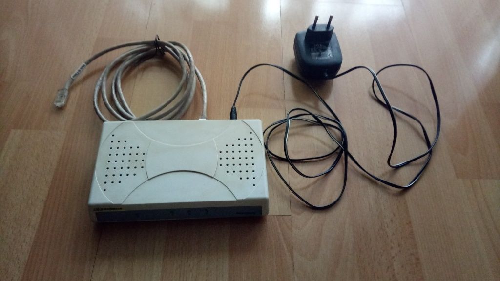 2 Routery/modemy D-Link, Netia Voice Gateway VG-1D1V-SIP,DSL-2740B