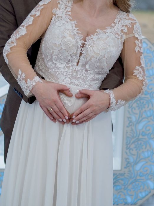 Suknia ślubna z rękawkami