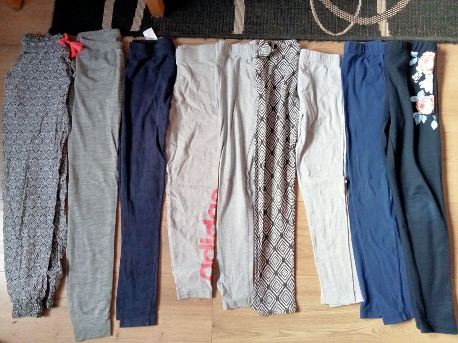 18 par  leginsów w różnych kolorach i wzorach na 8 - 10 lat