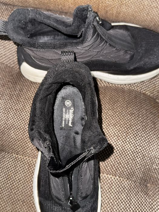 Зимове взуття жіноче