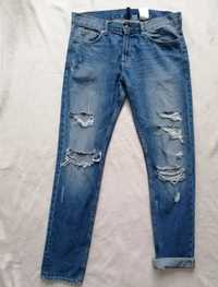 Spodnie jeans dżins z dziurami