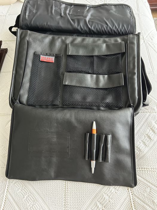 Saco tipo pasta em pele