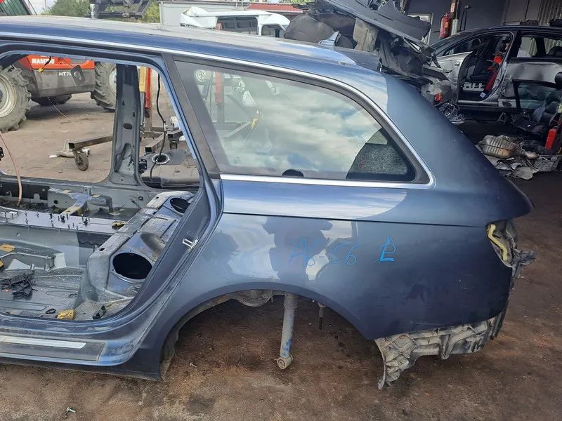 AUDI A6 C6 KOMBI 06r ĆWIARTKA BŁOTNIK LEWY TYŁ LZ7R