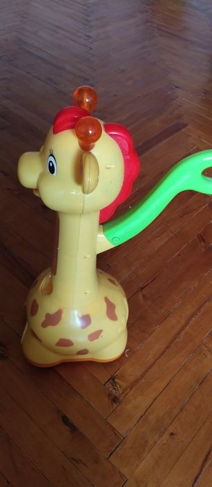 Іграшка-каталка жираф