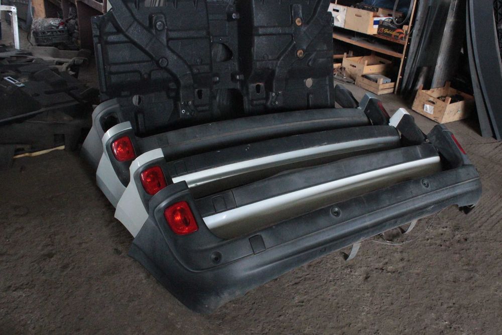 Бампер задній під парктроніки і глухий Renault Kangoo 2
