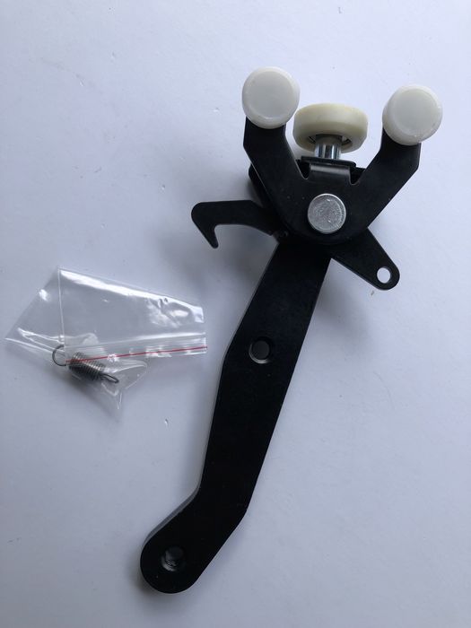 Ролик боковой двери нижний VW Transporter T5