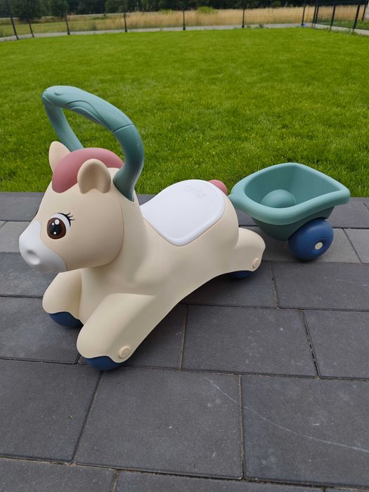 Pierwszy Jeździk Pony Ride-On Kucyk Z Przyczepką