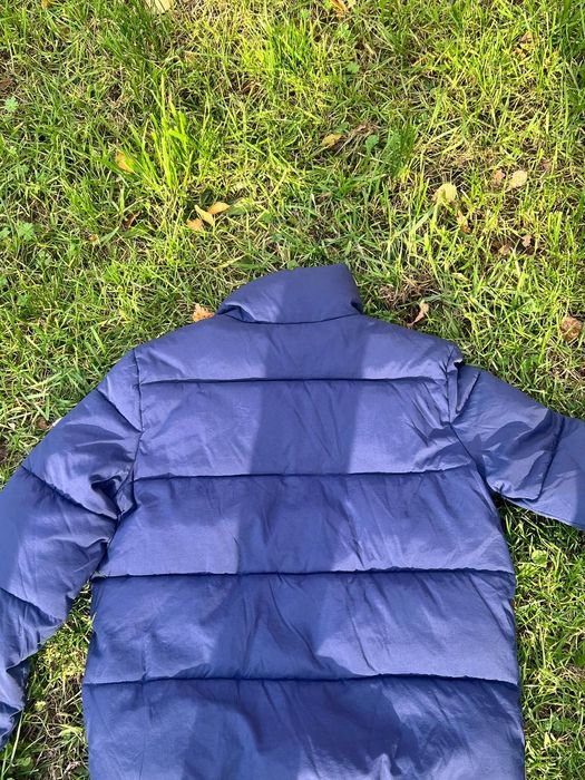 Куртка-пуховик темно-синього кольру на блискавці дві кишені на блискав