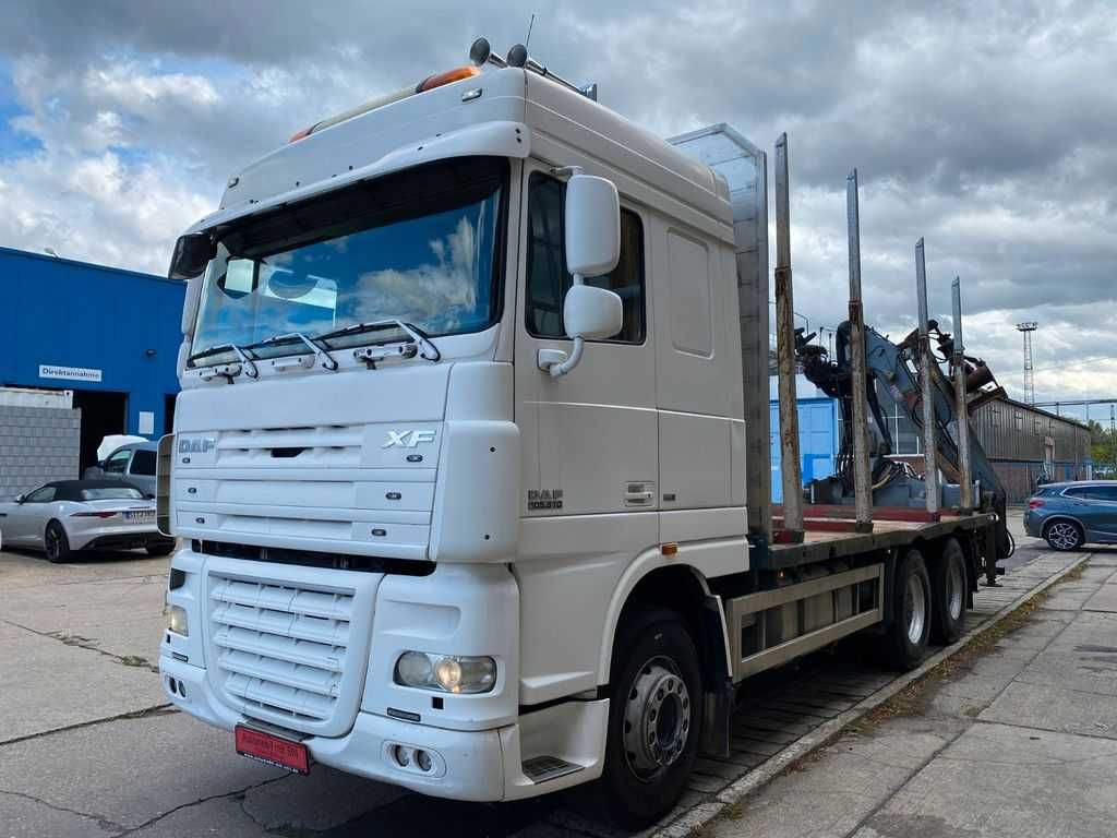 Лісовоз DAF 105.510 привід 6х4 кран PENZ 10000H Atlas для дерева