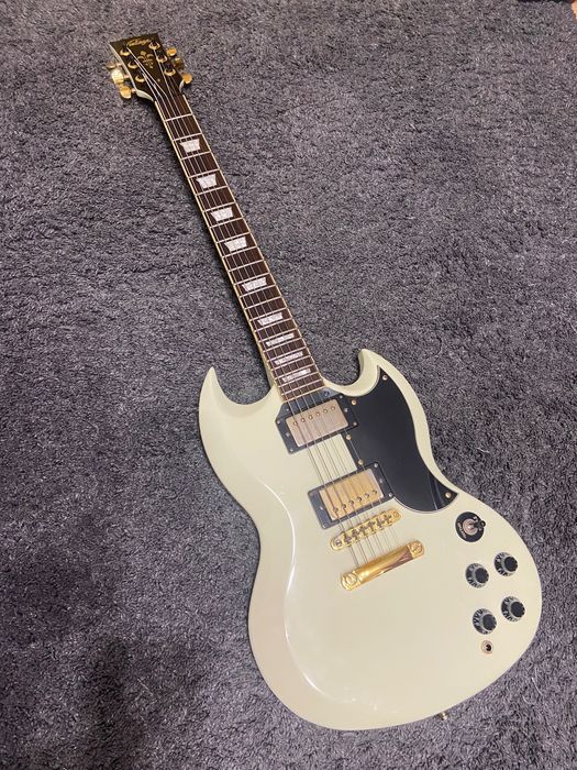 Vintage VS6 + Seymour Duncan Sh-6 + Trimlocks + gigbag / SG / Viper