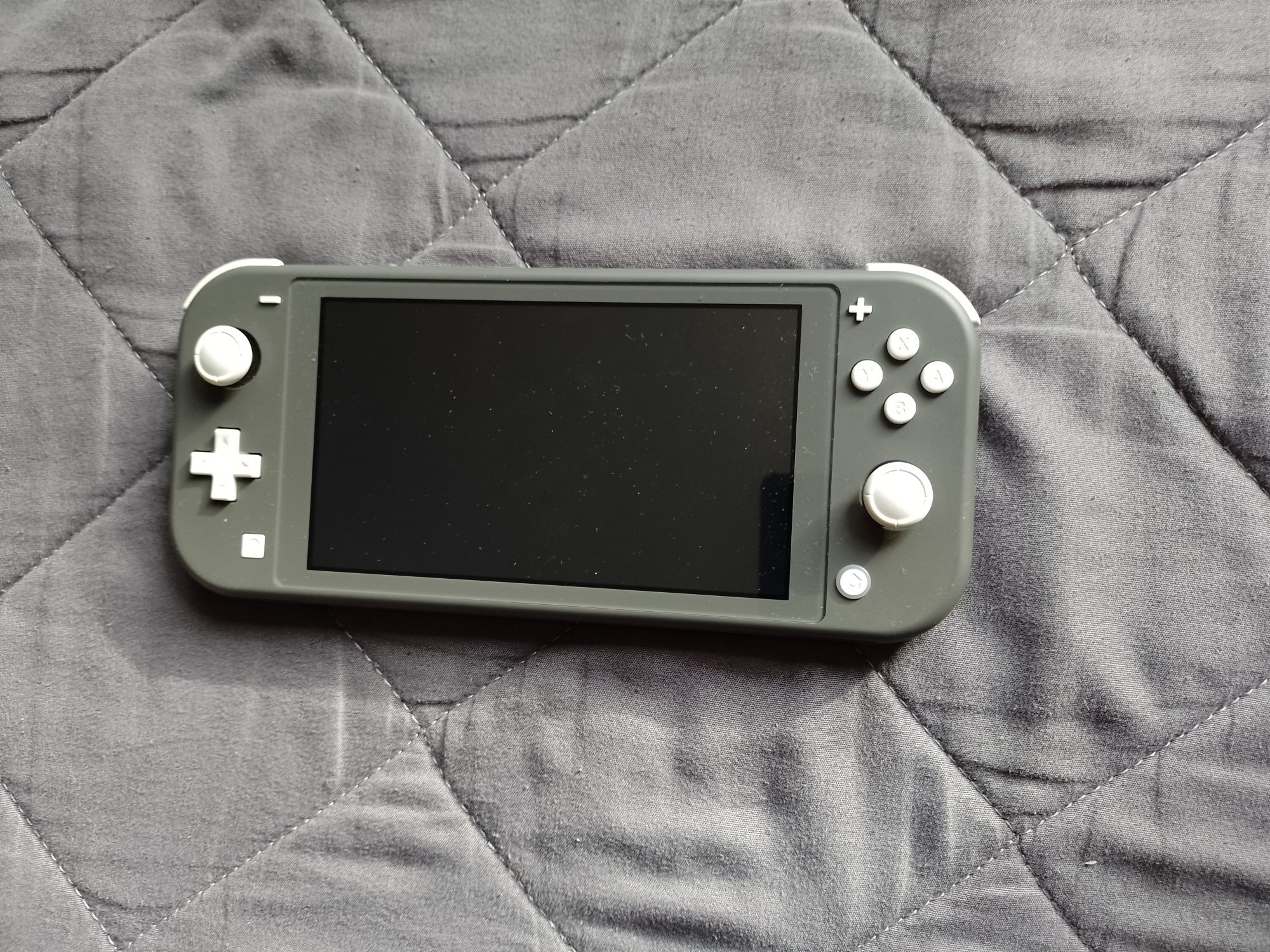 Nintendo switch Lite +2 gry