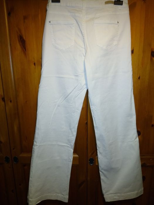 białe jeansy flared Promod rozmiar 40