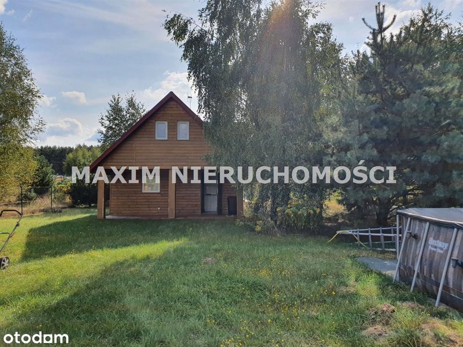 Domek letniskowy na dużej działce z Wz