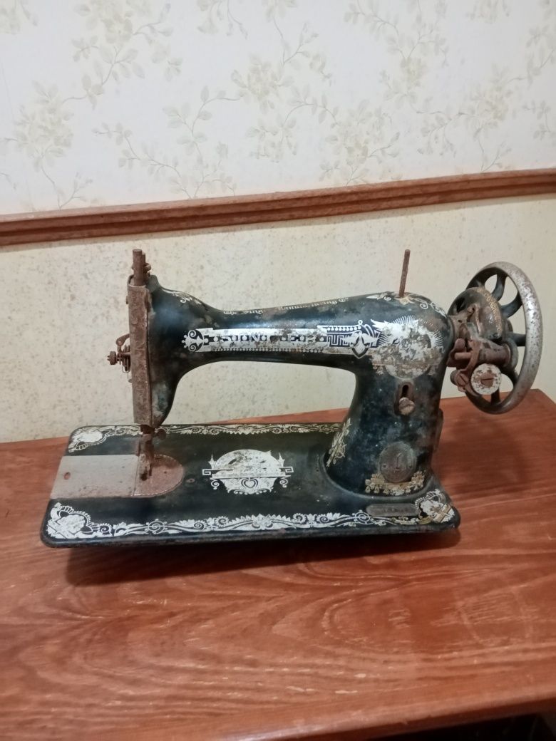 Máquina de costura singer