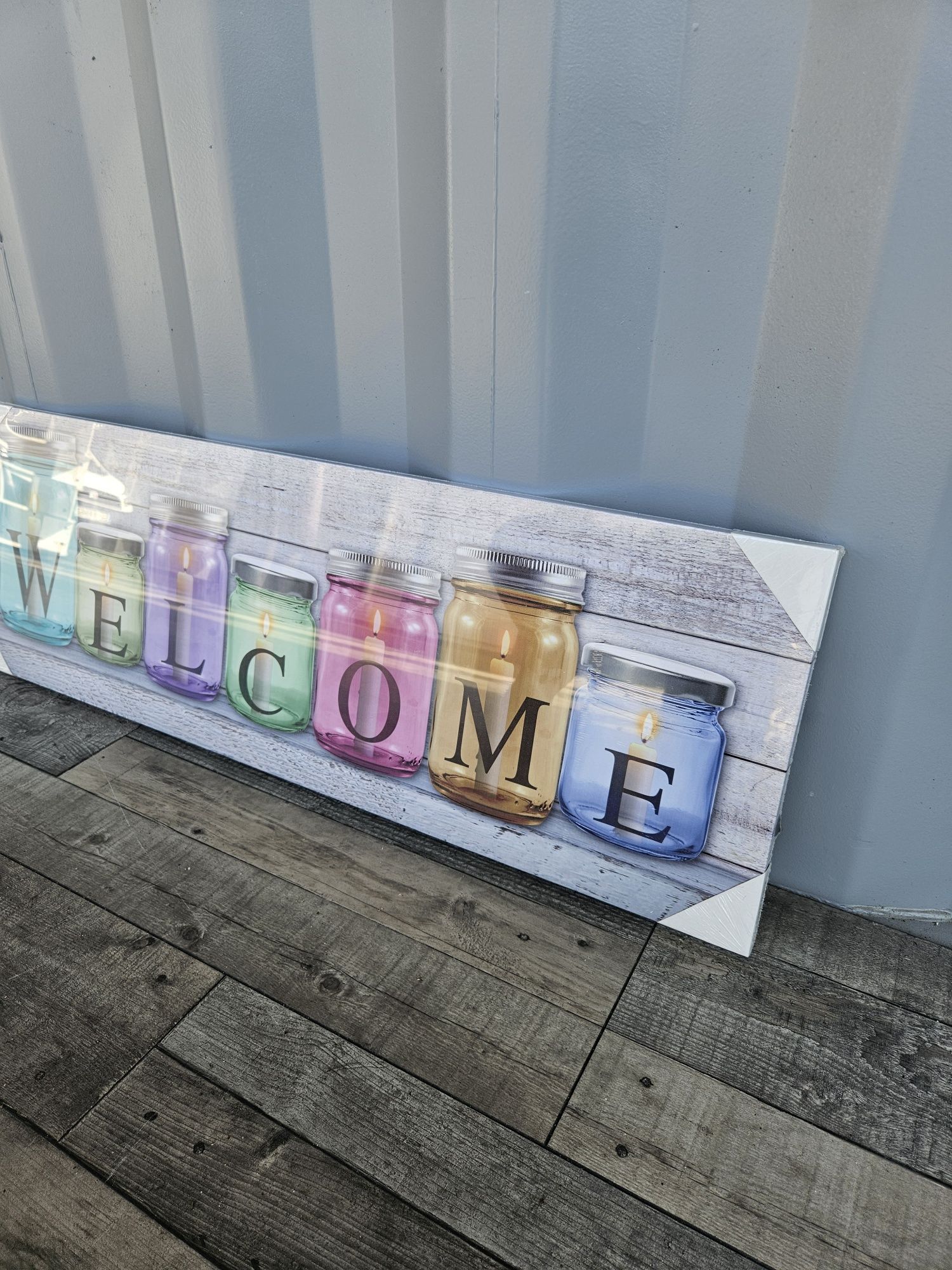 Obraz obrazek welcome świeczki w słoikach
