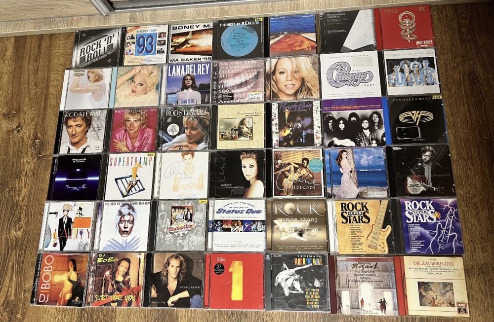 Pakiet 42 CD Beatles Toto David Bowie Supertramp Rod Stewart REM