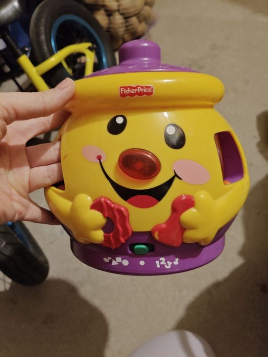 Garnuszek na klocuszek fisherprice