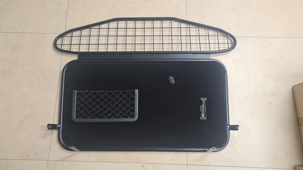Opel Astra J - Przegroda bagażnika  - kratka