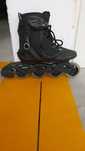 Patins em linha pretos, em muito bom estado