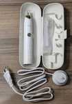 Szczoteczka soniczna Smilesonic EX + ładowarka + końcówka + etui