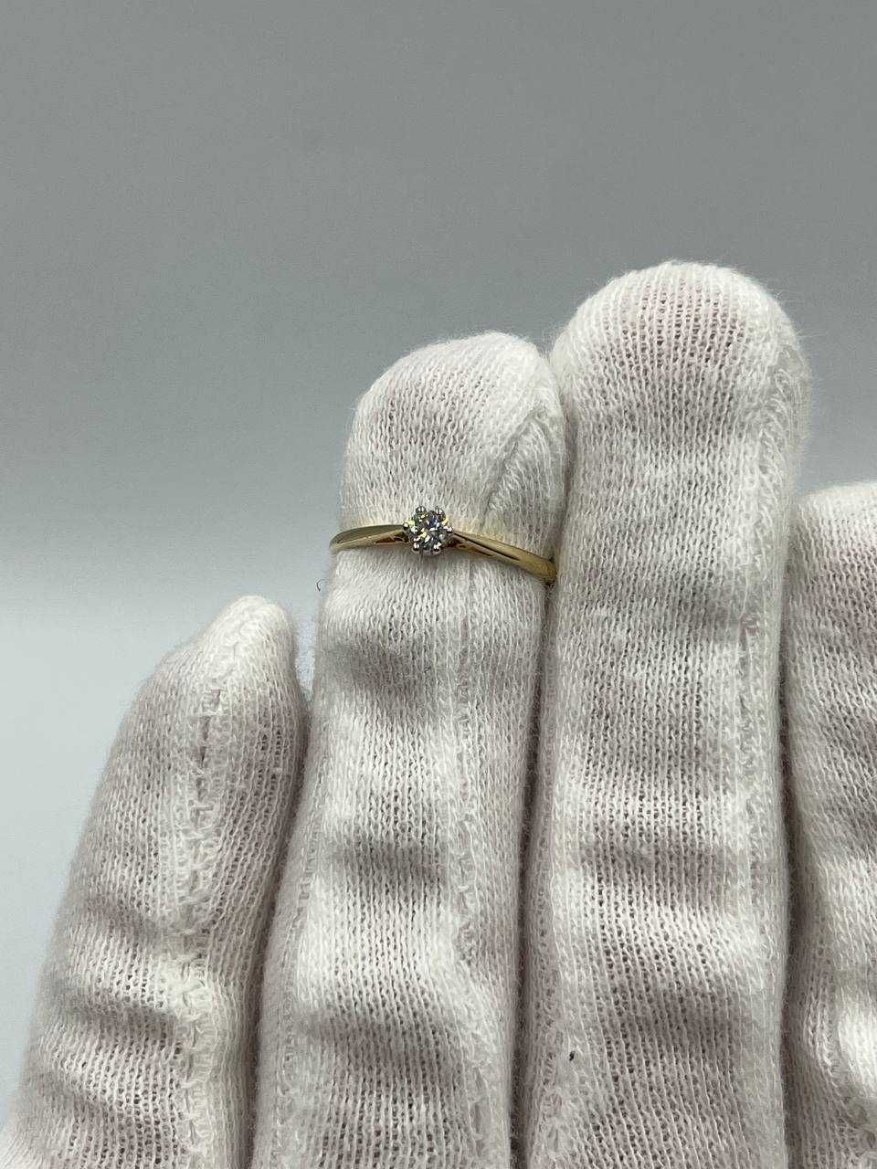 Złoty pierścionek z brylantem 14K 1.50g