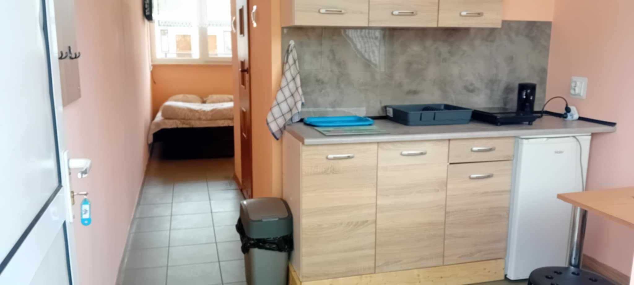 Pod Palmami ,domki i pokoje w centrum