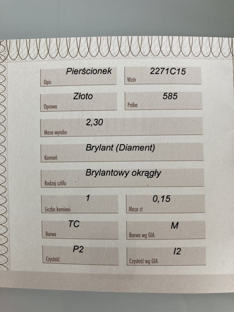 Pierścionek złoty z brylantem