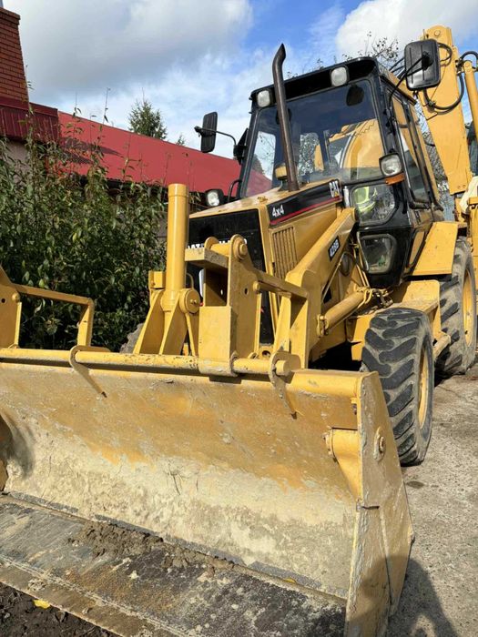 Koparko-ładowarka Caterpillar 428B