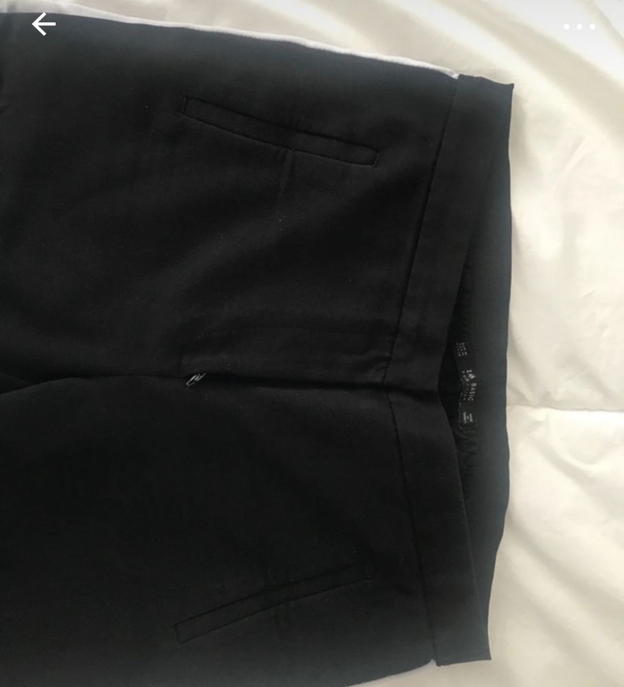 Calças pretas com faixa lateral branca - Zara