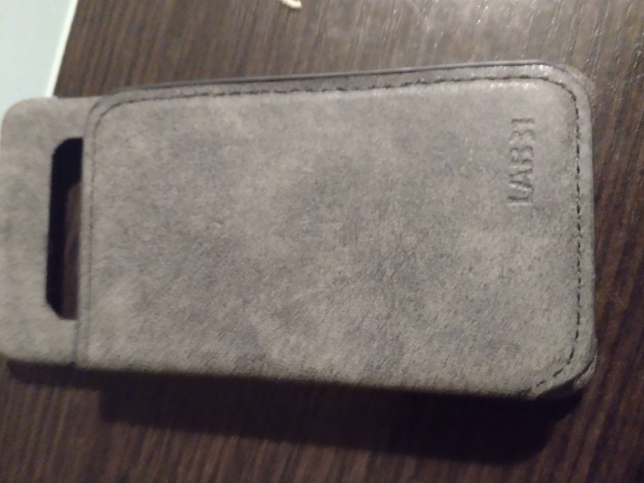 Sprzedam oslonę na tel rozmiar 15 cm na 7 cm siwy lub brązowy kolor