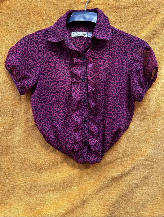 Blusa fúchsia leopardo. Como nova.