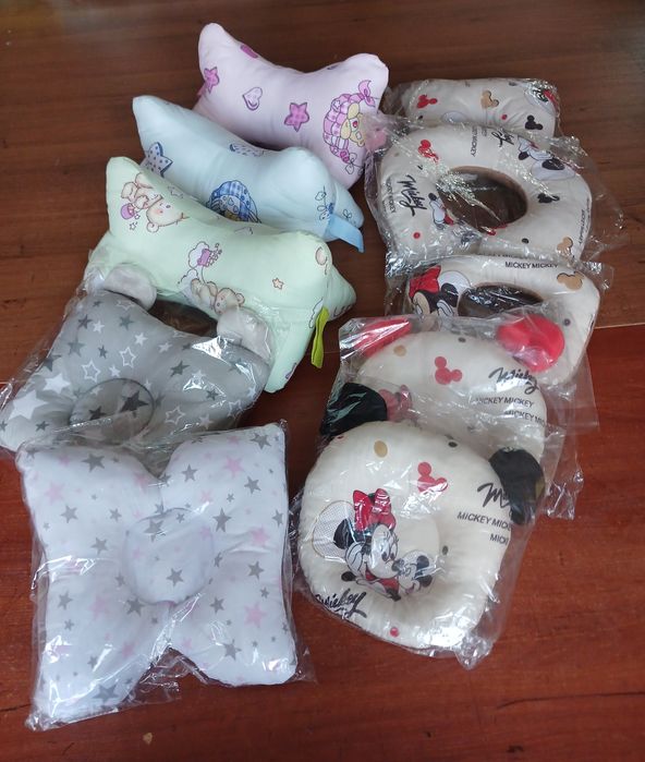 Подушечки  ортопедичні.і москітна сітка універсальна. Нові.