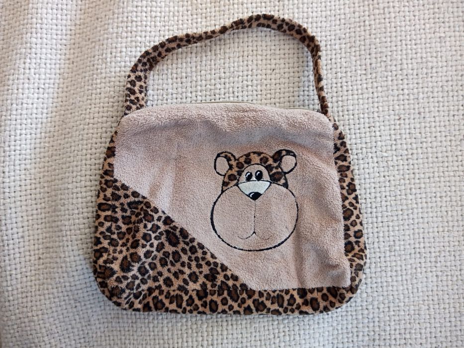 Dziecięca torebka na krótkim pasku