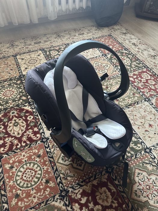 Автокресло люлька с 0+ Stokke