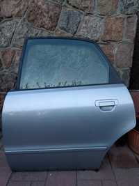 Lewe tylne drzwi Audi A4 B5.
