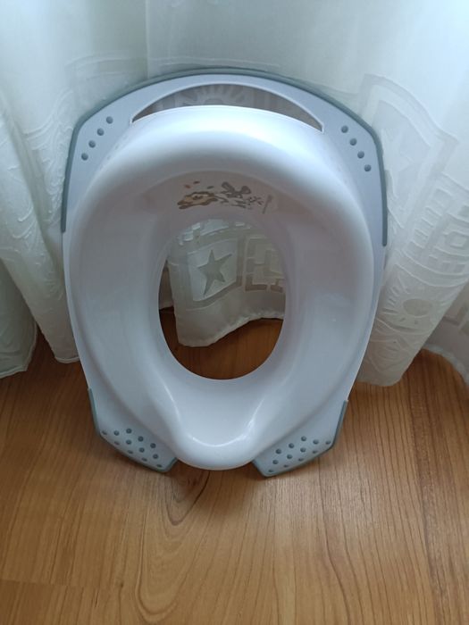 Redutor de sanita criança