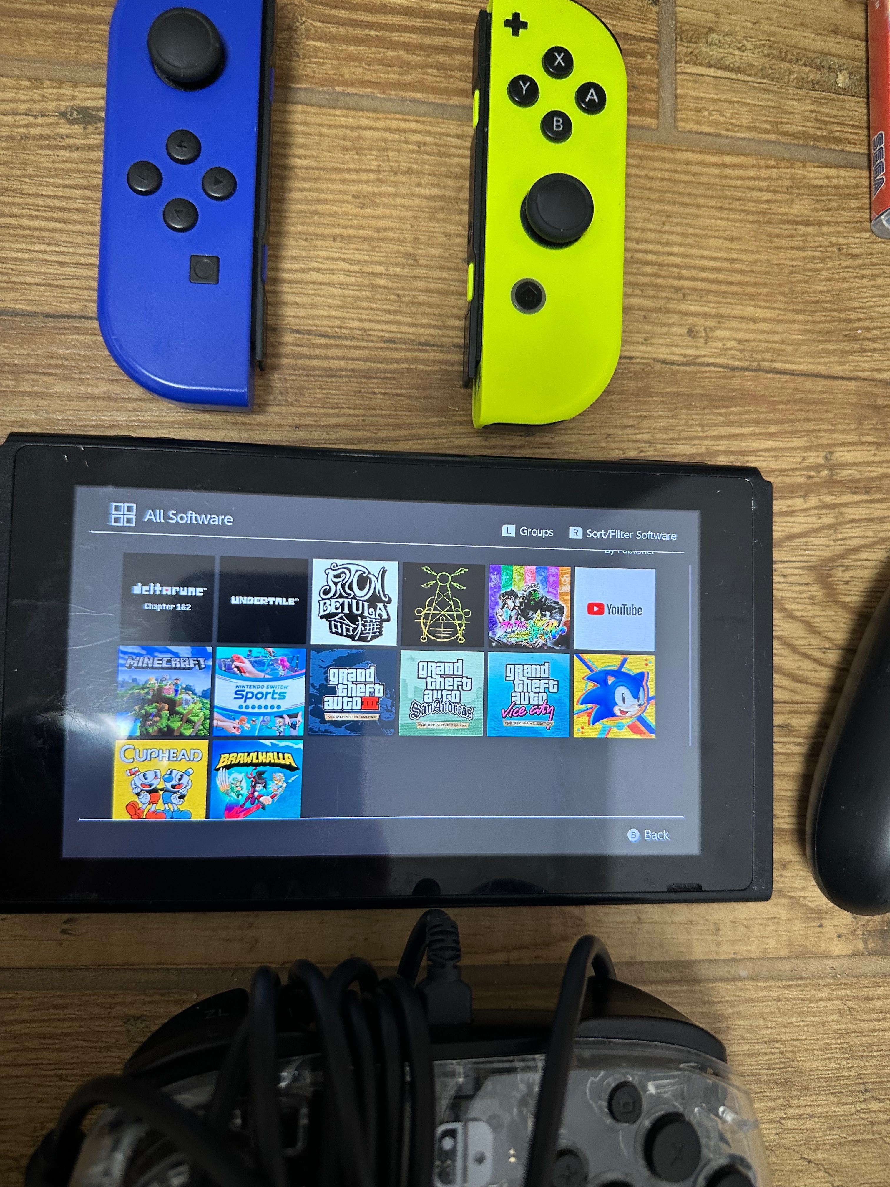 Nintendo Switch/oryginalne akcesoria/12 gier