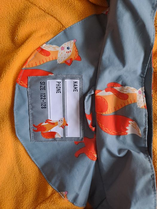 Tchibo Dziecięca termoaktywna kurtka przeciwdeszczowa rozm. 122/128