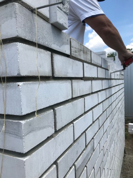 Монтаж фасадных термопанелей под клинкерный кирпич.