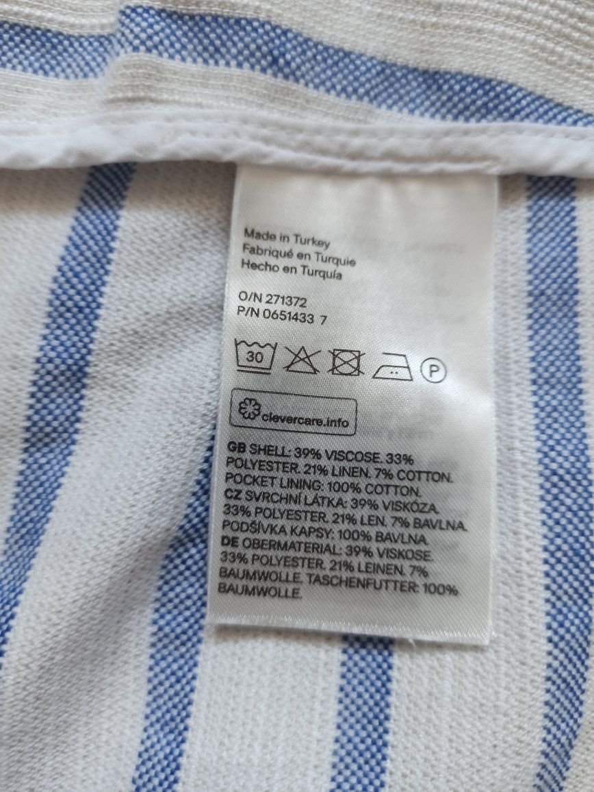 Biała spódnica mini kopertowa z paskiem w talii w pionowe paski