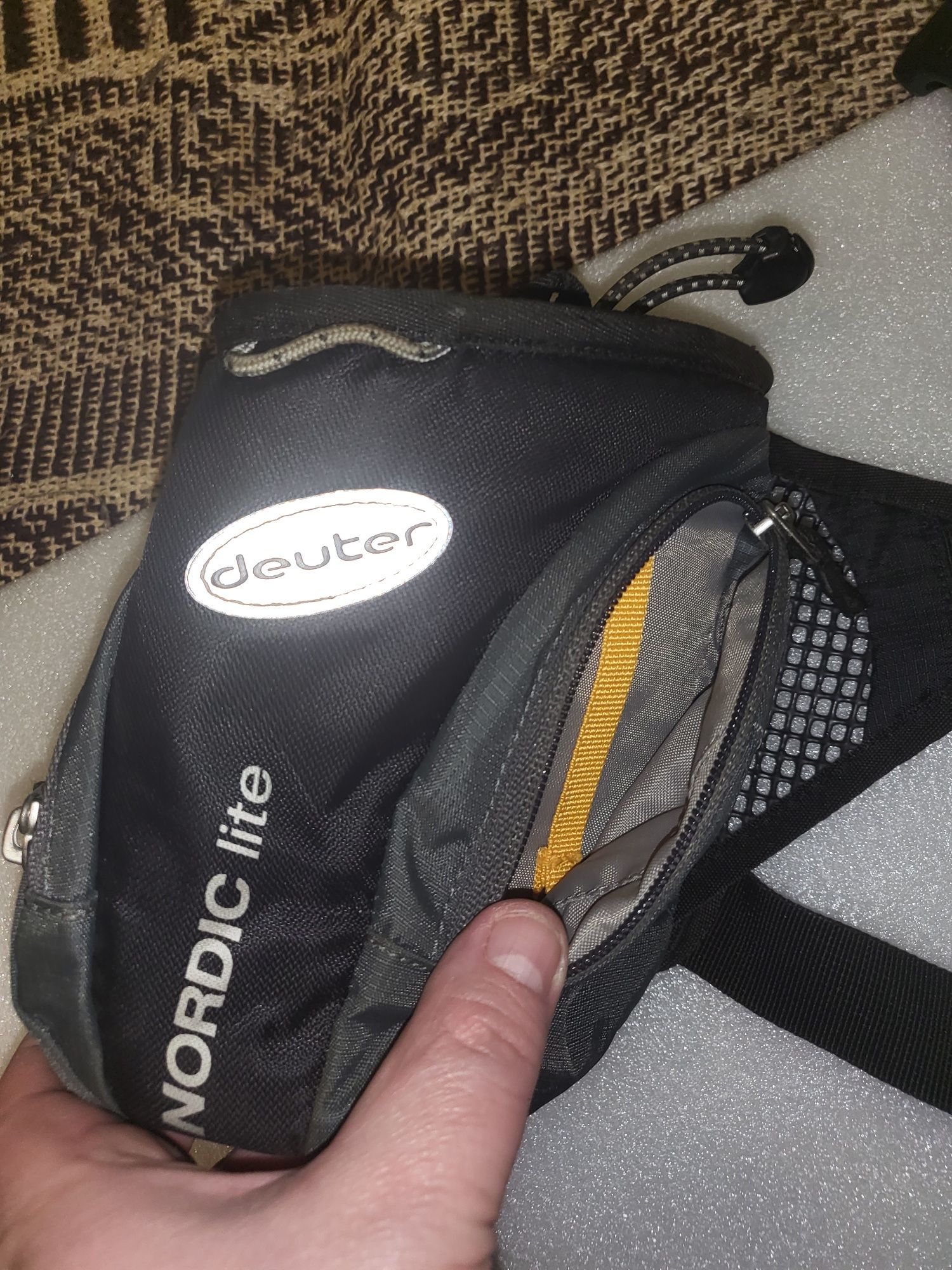 Szaszetki sportowe Reebok i Deuter