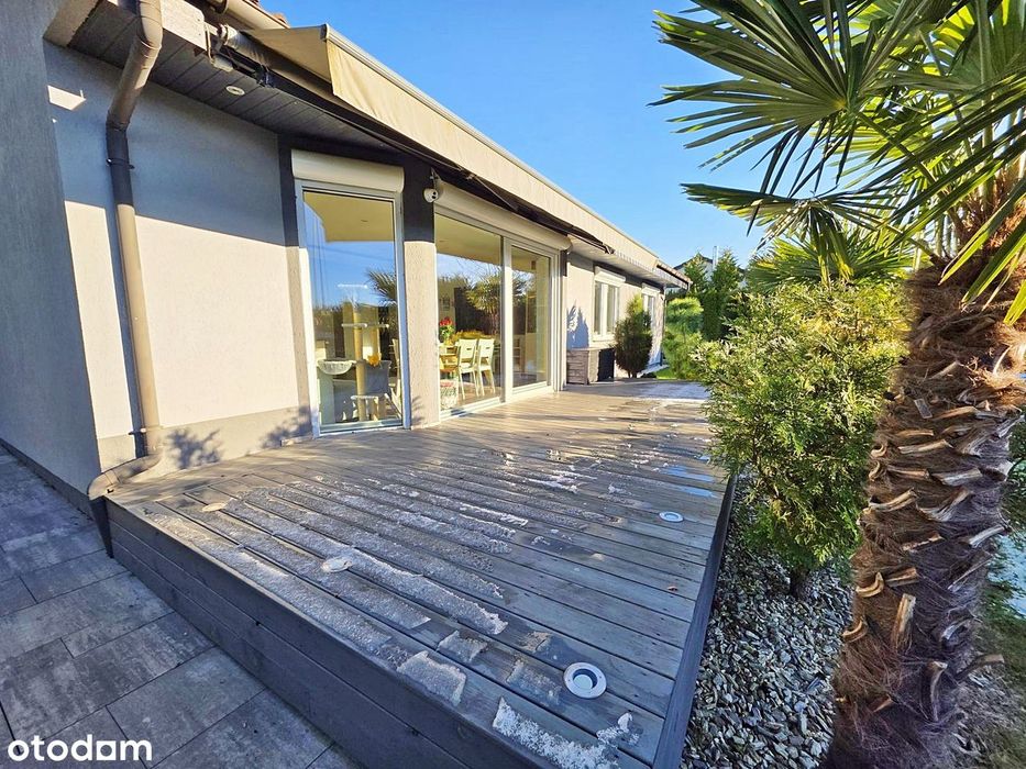 Zadbany dom parterowy Koszalin ul. Pistacjowa. Ładny ogród, duży garaż