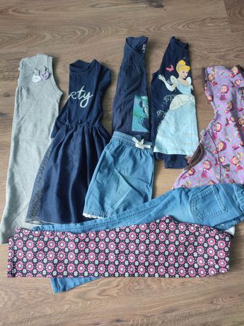 Zestaw ubrań 122 dziewczynka 8 szt jeansy sukienki bluzki
