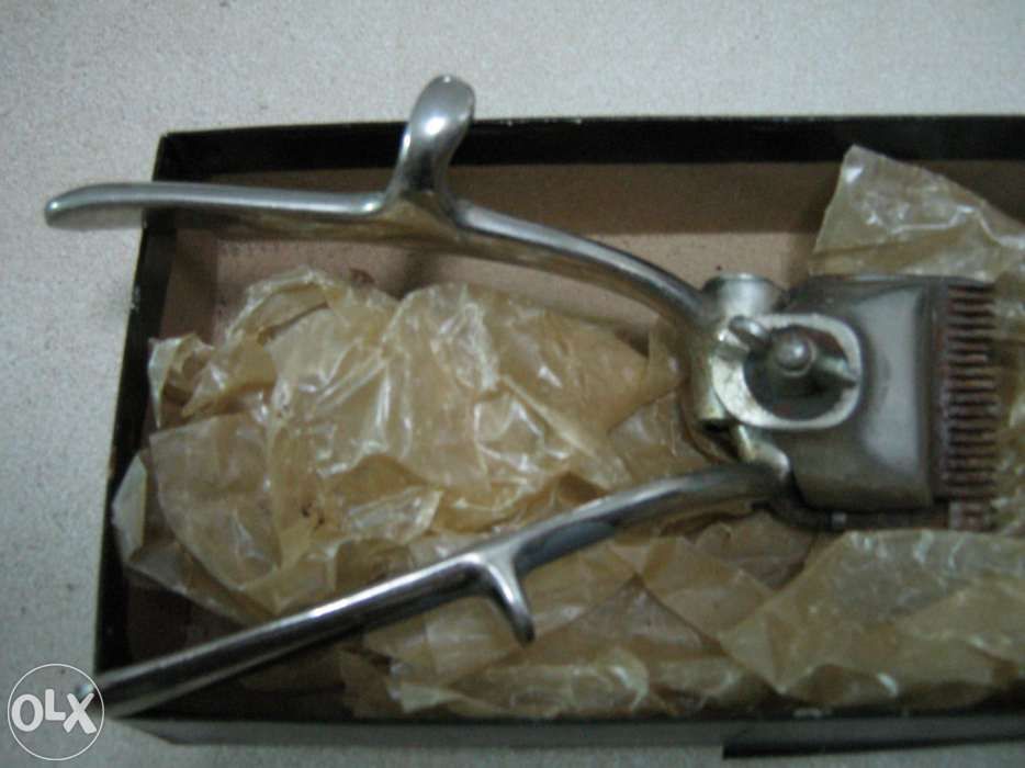 Máquina de cortar cabelo antiga