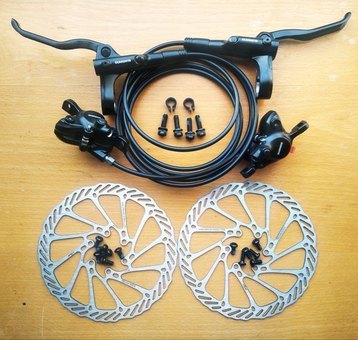 Нові гідравлічні дискові гальма Shimano MT200 комплект передні+задні