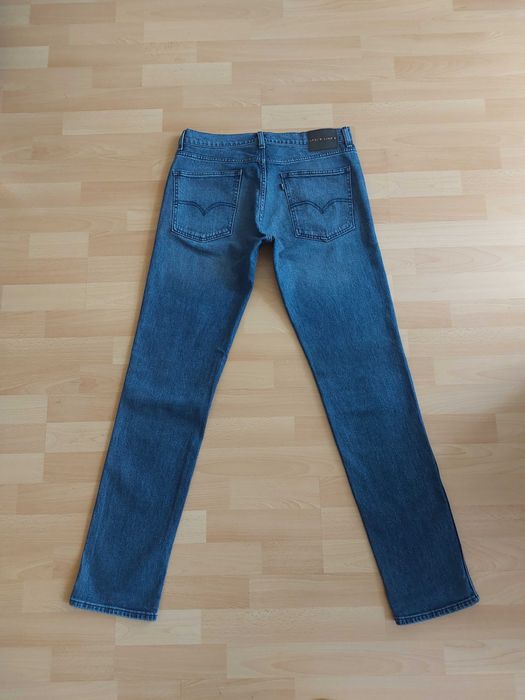Levis Strauss W32 L34 spodnie jeansowe dżinsy slim proste 32/34