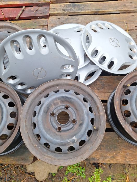 Felgi stalowe GM 13 cali z kołpakami Opel Astra F